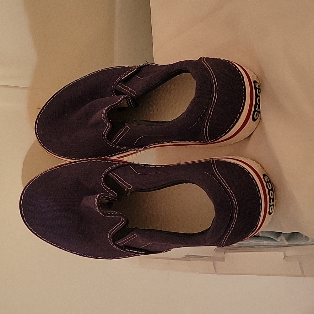 Crocs Women's Slip-On Canvas Sneakers in Deep Purple/Navy.